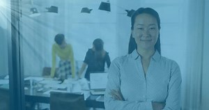 Animation of flowchart of icons and lens flare, smiling asian woman standing arms crossed in office. Digital composite, multiple exposure, communication, direction, medical and technology concept.