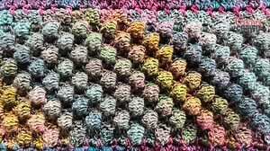 Jeanne has finished her 2nd Sample of the Inspired by Friendship Blanket... I still have to finish my 2nd sample. The pattern is written fully and we are testing it. I don't have a launch date yet. Her sample came out amazing as you can see in the photograph. Get hooked up with details. Some of the pattern is ready to go. We don't have yarn quantities yet. We are working through this is in real-time. https://thecrochetcrowd.com/inspired-by-friendship-crochet-blanket/ | The Crochet Crowd