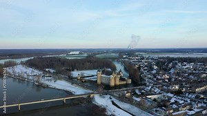 The castle of Sully sur Loire surrounded by a moat in Sully sur Loire in Europe, in France, in the Center region, in the Loiret, towards Orleans, in Winter, on a sunny day.