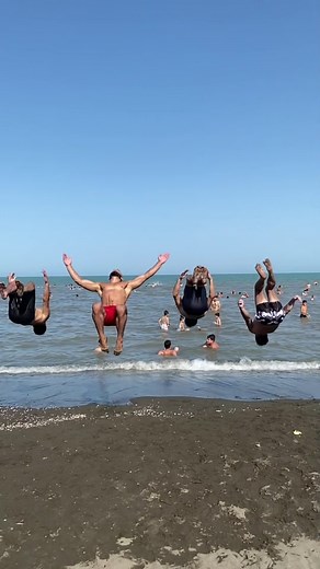 Synchronized Diving Fun on the Beach