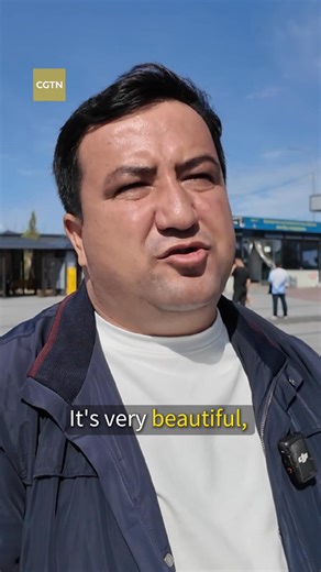 Reporter Liu Mohan takes us to Horgos Port in Ili, Xinjiang, where the majestic new national gate stands tall and container trucks loaded with goods line up in a vibrant scene of trade and connectivity. As a vital hub for Sino-foreign trade and a key platform for regional cooperation between China and Kazakhstan, Horgos is not only a logistics center—it's a critical link in the economic corridor connecting China with Central Asia. In an interview, Goibnazarzoda Said, a member of the Lower House 