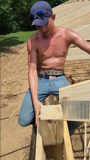 Setting 60 foot trusses.