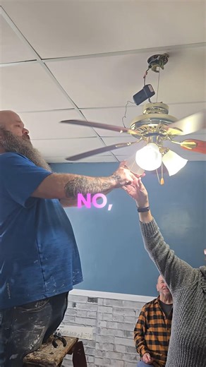 “Installing a ceiling fan shouldn’t require this much frustration… 😅🛠️ #DIYFail #HomeRenovation