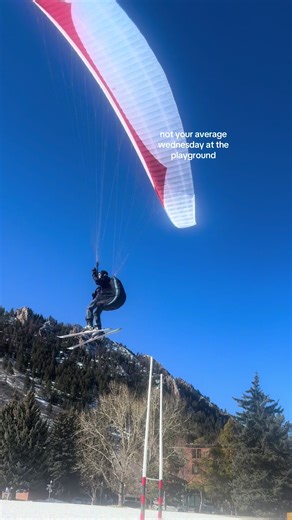 such a fun surprise while we were at the playground today! #paraglider #aspen #travelwithkids