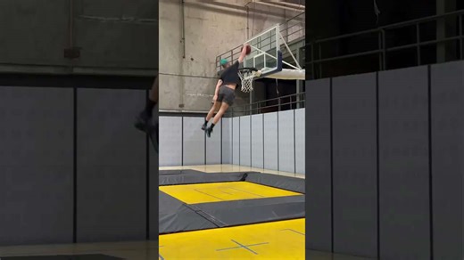 Insane double behind the back trampoline dunk!