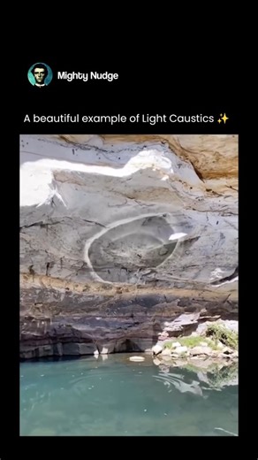 MIGHTY on Instagram: "Light caustics are beautiful and fascinating patterns formed when light is focused or bent by curved surfaces, such as water, glass, or reflective materials. Instead of spreading evenly, the light concentrates into bright, shimmering lines or curves, creating the glowing patterns we often see at the bottom of swimming pools, inside a cup of water, or on walls when sunlight passes through a glass. These patterns occur because of refraction and reflection. When light travels 