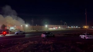 One of the last two oldest hangars at Roswell, built in 1942, burned down tonight. This is my footage from atop the train loading platform where we stand during the tour. | The Roswell UFO Tour