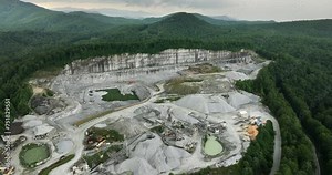 Open pit mining site of limestone materials extraction for construction industry