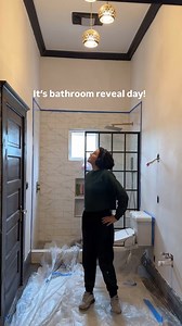 PARENTS’ BATHROOM REVEAL ✨ From dated and flawed to warm and sophisticated! I’m so in love with the walnut medicine cabinets and double vanity, which add so much functional storage and perfectly fit the style of this 1915 home. Add in some curves with the brass sconces and faucets and a soft wool runner, and it’s just the perfect balance! | Renee Renovates