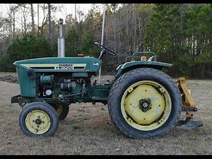 Plowing new garden with Yanmar YM1700 and middle buster!