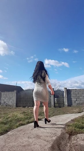 Elegant Outdoor Walk in Stylish Summer Dress