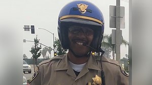 CHP officer killed in gun battle near California freeway