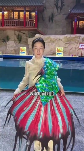 Looked like a weird costume at first, but the sight was stunning once she jumped into the water #...
