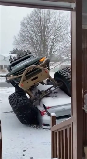 Lifted Pickup Lands on Parked Car After Jump in Residential Street 🚙❄️