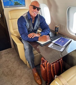 Dwyane The Rock Johnson Is All About Business on His Private Jet