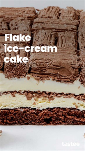 Summer holidays means ice-cold treats like this Flake ice-cream cake made with bought vanilla ice-cream, chocolate cake and 30 Flake bars! For the recipe, Google 'Taste Flake ice-cream cake'. | Taste.com.au