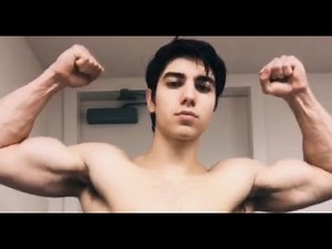 Eric flexes his muscles