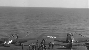 Two Grumman F6F-5 Hellcats of VF-20 are catapulted off the deck of USS Enterprise (CV-6) on August 28, 1944. The Big E left the Fleet anchorage at Eniwetok the previous day and is heading for the Bonin Islands to conduct a raid. The previous year at Bremerton, Enterprise had her 2 hydraulic H 2 catapults upgraded to H 2-1. These could launch an 11,000 lb aircraft at 70 mph along a 73 ft stroke. The ship's speed could add another 35 mph plus whatever speed the wind was blowing. The F6F-5 Hellcat 