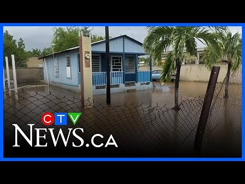 Puerto Rico hit with flooding, power outages from Hurricane Erin