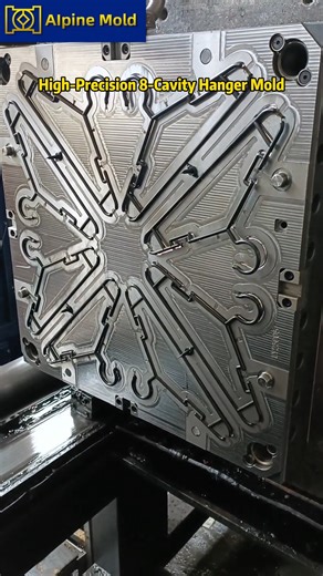 Alpine Mold on Instagram: "📌 Multi-cavity molds are not just about numbers — consistency is the real challenge. This high-precision 8-cavity hanger mold required tight dimensional control across long, thin parts. To achieve stable mass production, we focused on: 🔧 Balanced runner and gating design for uniform filling across all cavities ❄️ Optimized cooling layout to reduce warpage and internal stress 📐 High-precision CNC machining to ensure cavity-to-cavity consistency 👉 The result: stable 