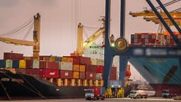 Timelapse unloading Cargo container box to Trucks in Shipyard Cargo...