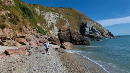 The tiny secret Irish beach with crystal clear water, incredible views & seals