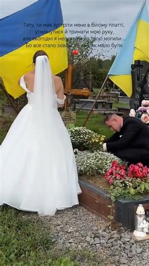 On their wedding day, the bride and the groom visited the grave of her father—a Ukrainian Hero who was killed in the war against Russia. | In Ukraine