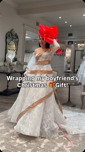 Nayri Kalayjian on Instagram: "Merry Christmas🍯! You’ve been gifted a fiancé ready to walk down the aisle! 👰‍♀️💍🎁🎄@lovellabridal wearing @berta 🤍✨ • • • #weddingdressshopping #weddingdress #lacelongsleeveweddingdress #2026bride #christmasgift"