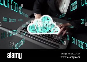 A business professional engages with a laptop, showcasing the concept of cloud technology and data analysis through digital graphs and innovative workplace solutions. Xenic Stock Video Footage - Alamy