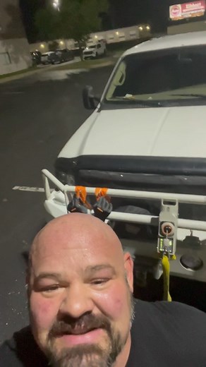 Brian Shaw on Instagram: "TAKE THE FIRST STEP 💪💯 I slammed a half scoop of @undfnutrition Greatness and Structure and got in an awesome parking lot workout with my @beyondpowerofficial connected to the Excursion bumper…pretty amazing what getting a workout in can do! Of course getting in the arm wrestling work as well with my @devlarratt training strap and my custom handles from @joedyharper 💪💪…things are getting interesting! Go out and BE GREAT!! #shawstrength #begreat"
