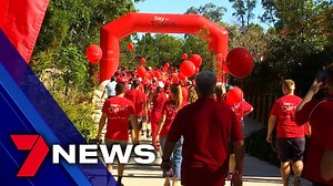 Day for Daniel: Bruce and Denise Morcombe have completed the walk for Daniel, 17 years after the disappearance of their son in 2003. In the wake of the pandemic, the annual event moved online this year with a record 5000 schools and early learning centres taking part - a 30% increase from last year. 300 people dressed in red also completed an invitation-only walk this morning through Palmwoods on the Sunshine Coast - a trip Daniel was never able to complete himself. "1.3 million people around Au