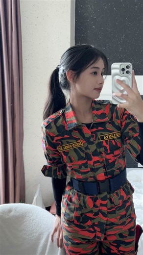 Captivating Mirror Selfie in Camouflage Jumpsuit