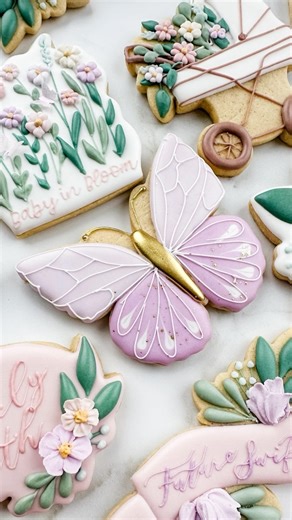Lindsay Johnson on Instagram: "Butterfly cookies are always some of my favorites to create. I love the different designs that you can create with wet on wet and tiny detailed lines. You have to see the rest of this set, it was for my sister’s baby shower (first girl after 5 boys in the family!) and it was one of my favorites I’ve created. Check it out my last post to see it! This butterfly cookie cutter can by found on my website or Etsy shop!"