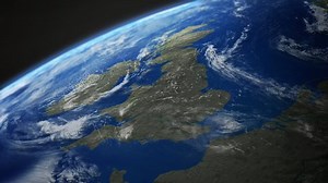 Map view of UK, Britain, England, Scotland, Wales, Ireland from above the clouds from space.