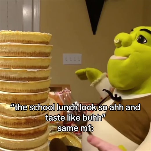 Shrek Enjoys Delicious Cheesecake