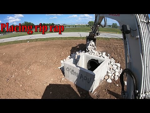 Backfilling The Catch Basin And Placing Rip Rap
