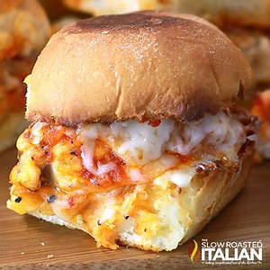 Chicken Parmesan Sliders are Game Day perfect! Your favorite chicken parm is transformed into a portable slider. Print or Pin Recipe: http://www.theslowroasteditalian.com/2013/10/chicken-parmesan-sliders.html