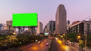 clip-1048196548-time-lapse-billboard-green-screen-city-traffic-light