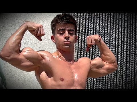 young bodybuilder showing his pumped muscle | flexing | muscle worship