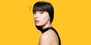 Here's Exactly How To Cut Or Trim Your Own Bangs At Home