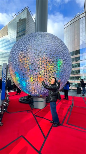NYC | Katja Sherlock on Instagram: "Today’s New Year’s Eve Ball Test atop One Times Square was a success! 🎉🪩 One day to go until NYE!! 🥳✨ Fun facts about the 2026 NYE ball: • It’s the Constellation Ball, unveiled in November 2025 • The largest NYE Ball yet — 12.5 feet wide and 12,350 pounds • Covered in 5,280 crystals • The 9th Ball since the first drop in 1907 • Powered by programmable LED light pucks allowing for customizable displays Share this with someone who would enjoy these views and