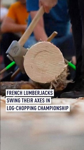 French lumberjacks swing their axes in log-chopping championship