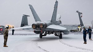 Exploring Finland's Chilly Base: Moving a Frozen US Fighter Jet