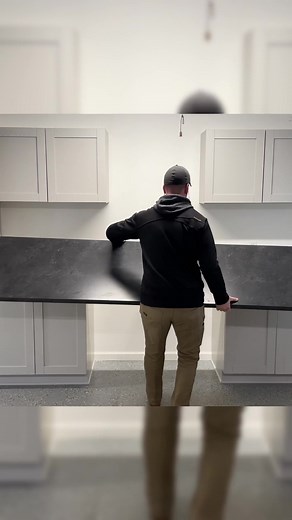 Who wouldn’t want a garage countertop this big to pile junk on 😅 • • #garageorganization #cabinetry #countertops #laminatecountertops #cabinets