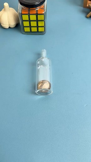 Can you think of a way to get the coin out intact without damaging the bottle #puzzle #iq #iqtest | Amazing Tools