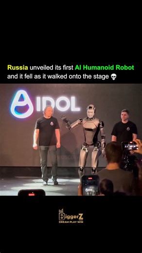 Entrepreneurialogy on Instagram: "When Russia unveiled its first-ever humanoid AI robot — AIdol — the world expected a futuristic marvel… but what unfolded became an unforgettable viral moment. As AIdol strutted onto the stage to the Rocky theme, cameras flashing and the crowd buzzing, it suddenly lost balance and face-planted — turning a proud debut into pure internet gold. 🤖💥 Yet behind the fall lies something truly groundbreaking. Built with advanced AI, facial expressions, and emotional re