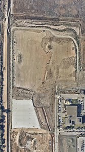 Construction of Google’s Bay View campus in Mountain View, California began in 2017 and the facility just opened to employees in May 2022. The all-electric structure is net water positive, powered by a dragonscale solar-skin exterior, and boasts the largest geothermal installation in North America. Located on 42-acres, Bay View can accommodate 4,000 employees. — Created by @dailyoverview Source imagery: @nearmap | Daily Overview