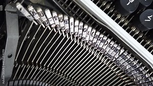 Mechanism of a retro typewriter. Old typewriter hammers.