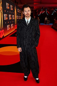 Harry Styles Wears Chanel Pinstripe Suit to the BRIT Awards