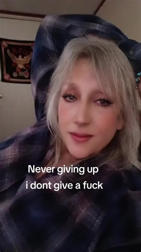 smiling wickly. well